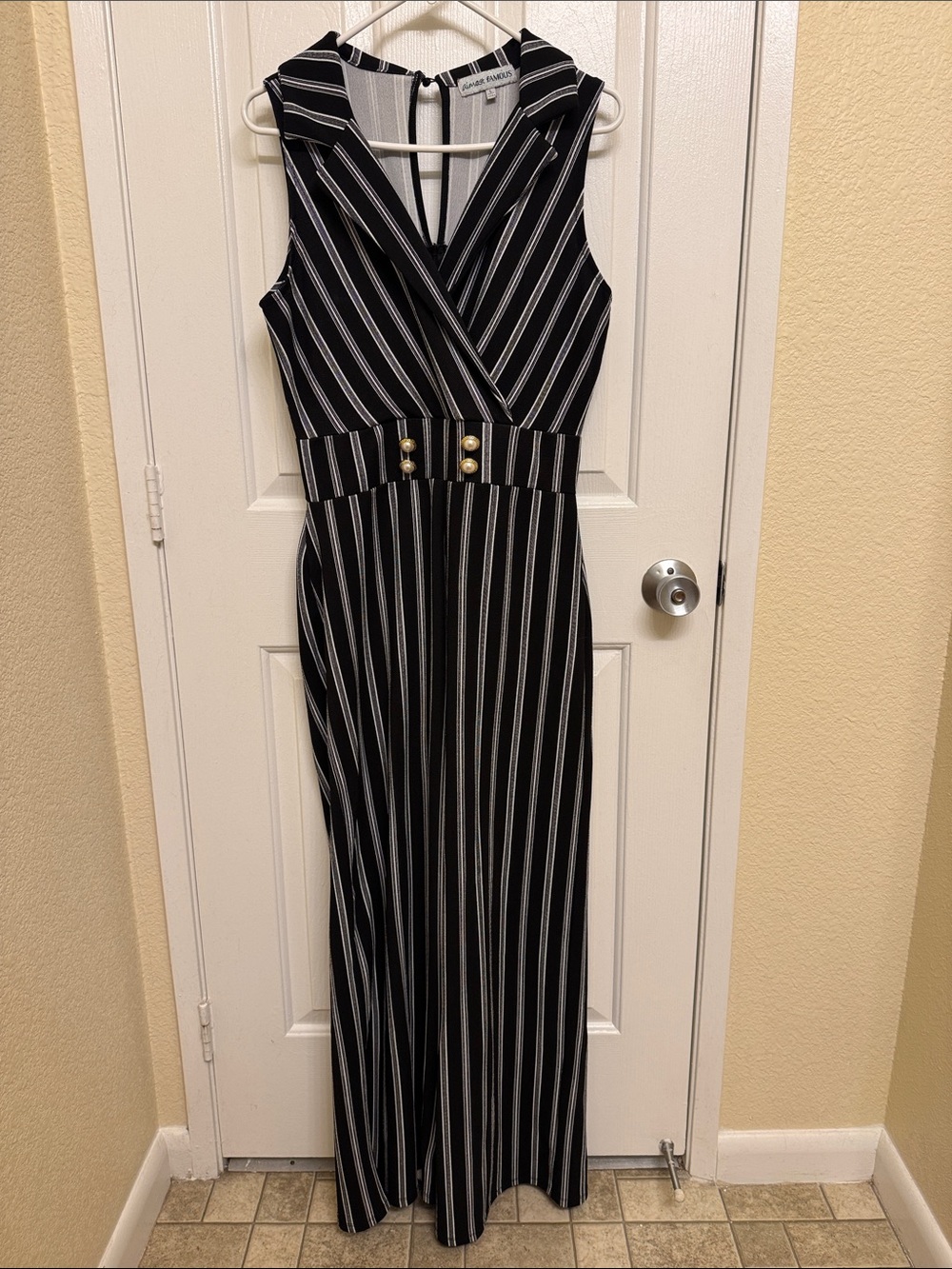 Black & White Striped Sleeveless Romper with Gold Button Detail